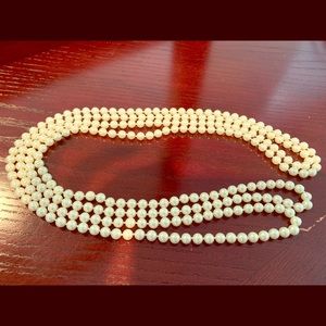 Extra long pearl necklace